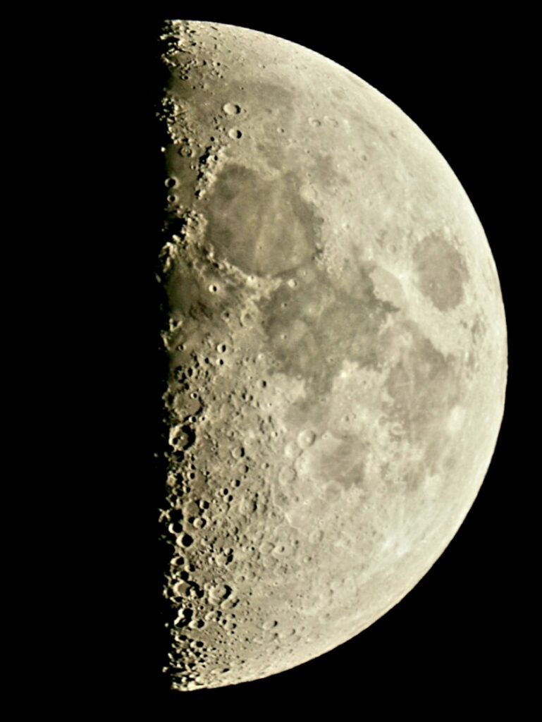 Half Moon showing X where crater tops show in the sunlight on the terminator.
